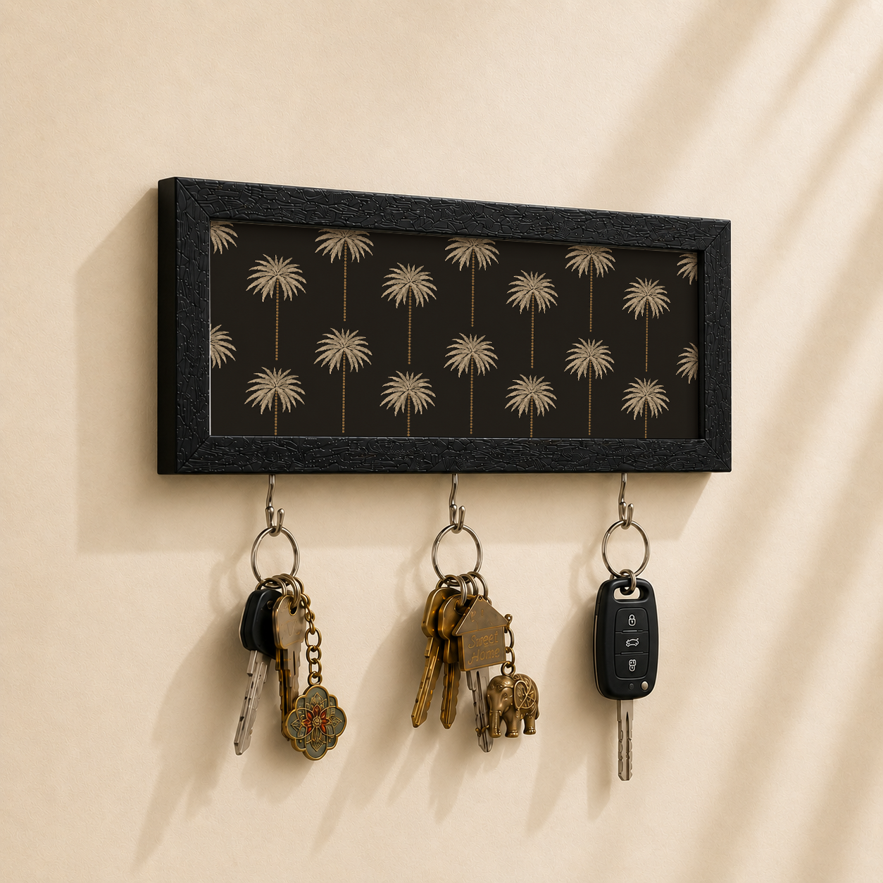 Key holder with elephant design on a beige wall