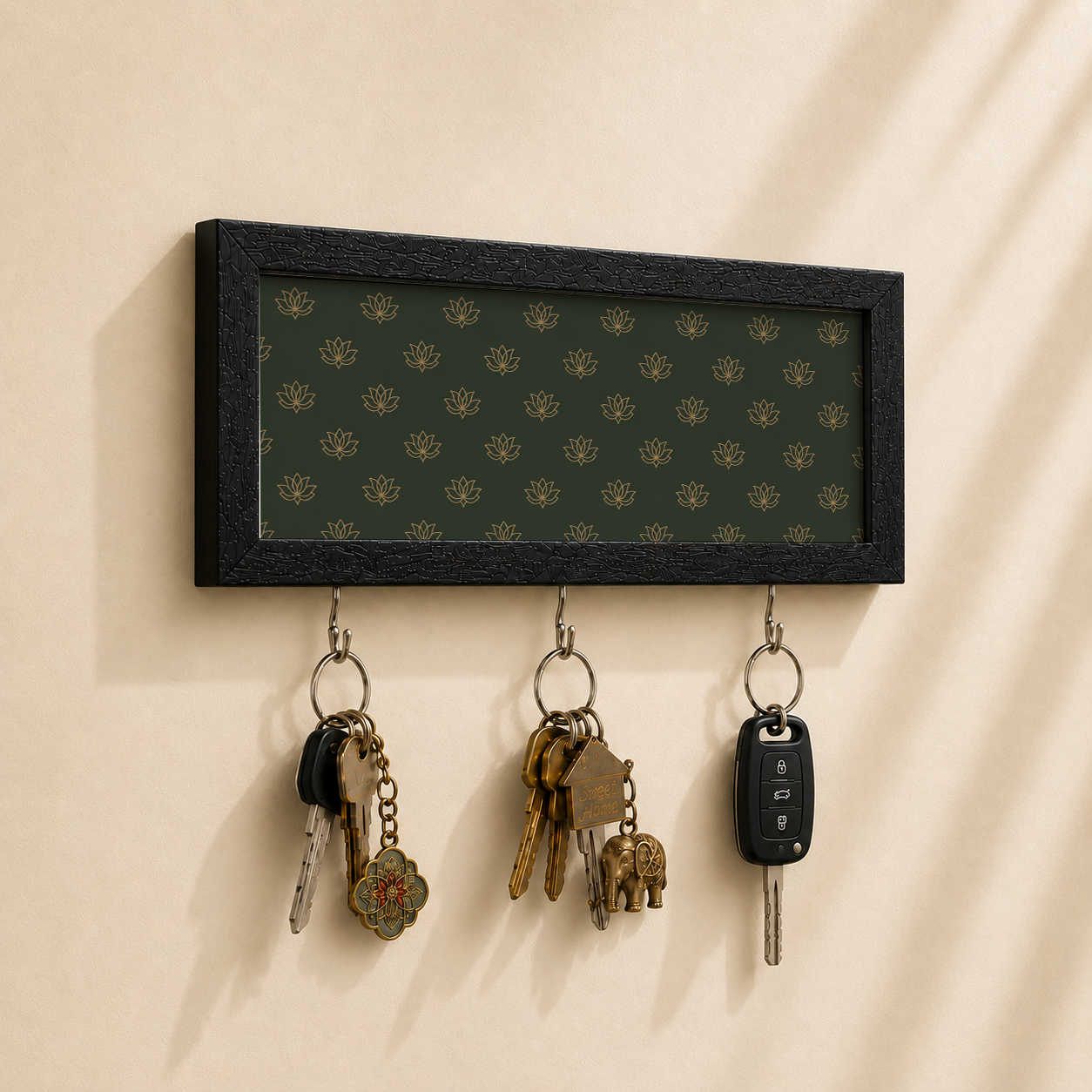 Key holder with elephant design on a beige wall