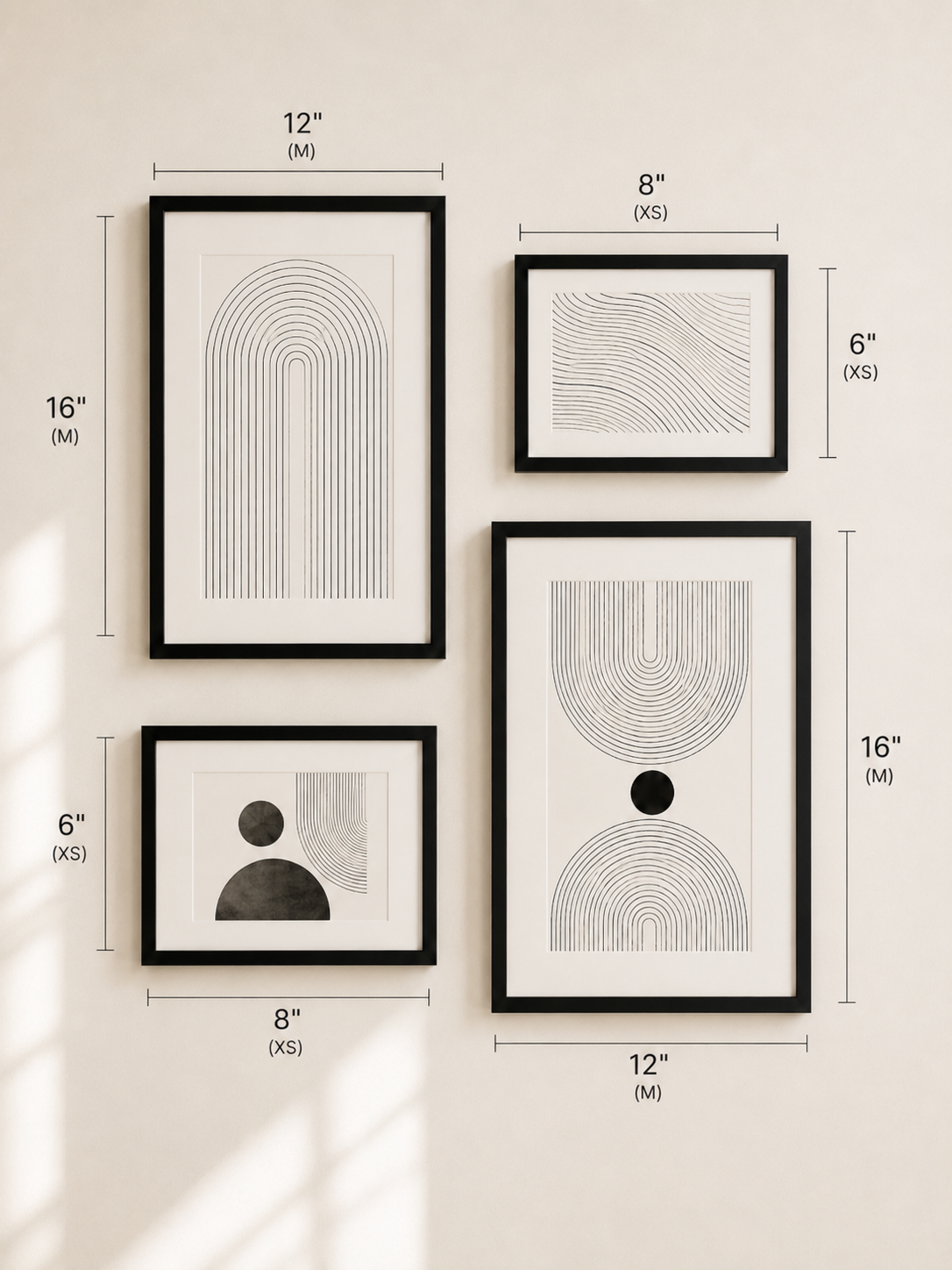 Four framed abstract wall art prints in black frames, arranged on a light beige wall with dimension callouts showing sizes in inches and centimeters.