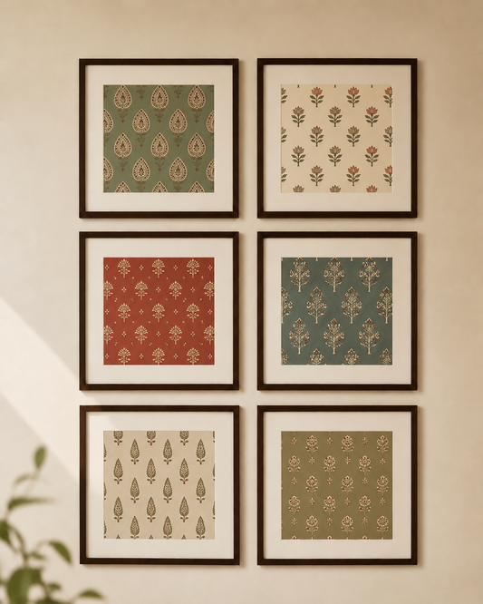 Six framed art prints with traditional Indian motifs in muted green, red, and beige tones, arranged in a 2x3 grid on a warm beige wall.