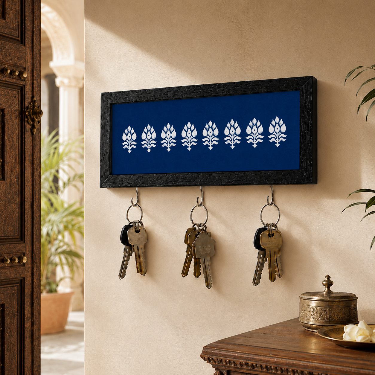 Close-up detail of the Navy Motif key holder from Purnam
