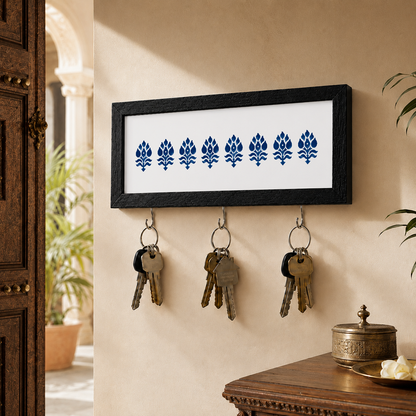 Close-up detail of the White and Navy Motif key holder from Purnam